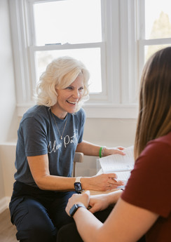 Pediatric speech therapist discussing speech and language evaluation results with a parent at Clear Path Pediatric Therapy in Mechanicsburg PA