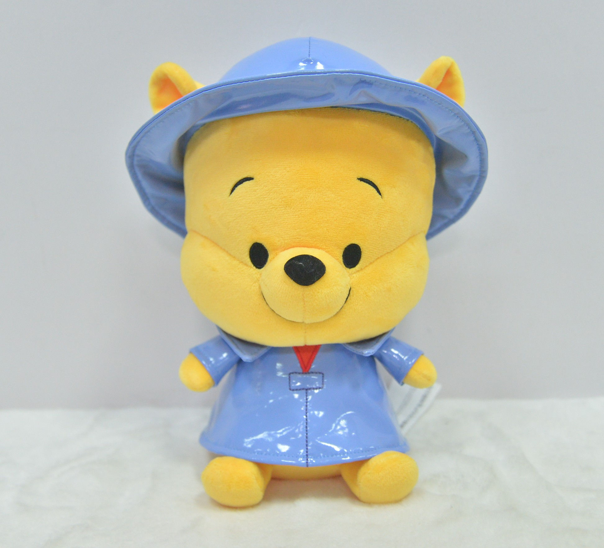 DISNEY 'Raincoat' series 9in plush - Winnie the Pooh