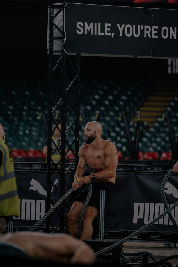 Coach ross on the sled pull station in his open solo race in Cardiff 2025