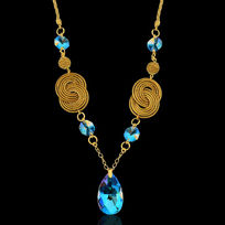 Collier herbe dorée orné de cristaux Swarovski