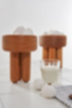 Par of Benta Wooden Bowls adorned with eggs and a glass of milk