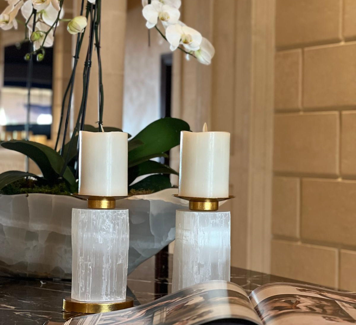 Par of Cedro Selenite Candle Holder in a room.