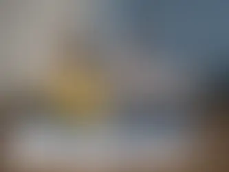 Couple sitting against each other