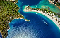 Голубая Лагуна-Фетхие-OLUDENIZ-BLUE LAGOON,Фетхіє, Олюденіз, Тельмесос, Мертве море, Лікійські гробниці, Парашути, Парапланеризм, Дивовижна природа, Каньйон Саклікент, Долина метеликів, Пляж Олюденіз, Каякой, Кармілассос, Бабадага, Мармарис