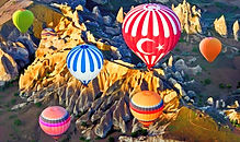 Каппадокия-Kapadokya-Cappadocia-Kapadokya-Екскурзия до Кападокия от Мармарис, Воздушни Балони в Кападокия, Подземни градове, Магическа Кападокия, Църква Свети Георги, Църква Св. Варвара, Църква Св. Василий, Дервиши, Мевлана, Гьореме, Християнски манастири, Музей под открито небе, Посещаване на великолепни места, Валшебна Каппадокия,Крепост Учхисар,ЮЧ ГЮЗЕЛЛЕР,въздушен балон,Земя на феномени,Приказна земя