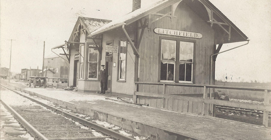 Cayuga Station with man in doorway on platform