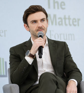 Official-Photo-of-Broderick-McDonald-speaking-on-stage-at-the-matter-forum-2026