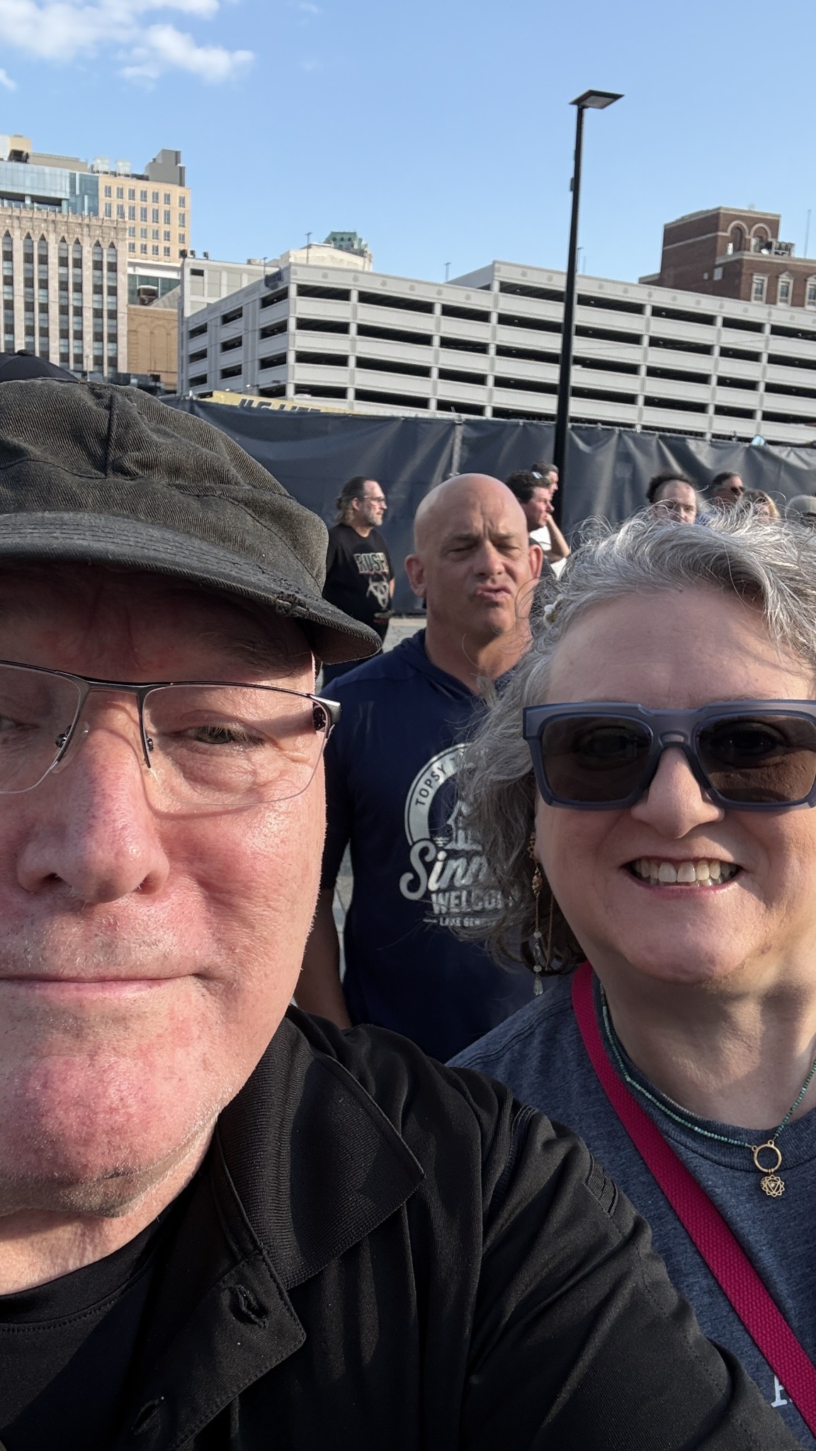 Joseph Thompson and Natalie together outdoors in downtown Detroit during their August 2026 concert weekend.