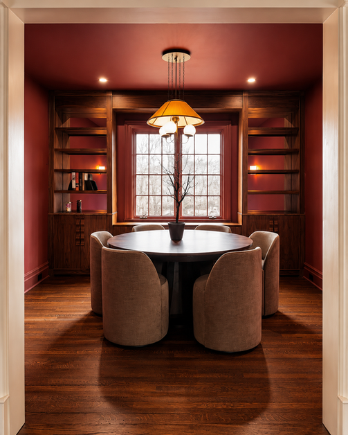Sophisticated Rockland County dining room with custom cabinetry and hardwood floors.