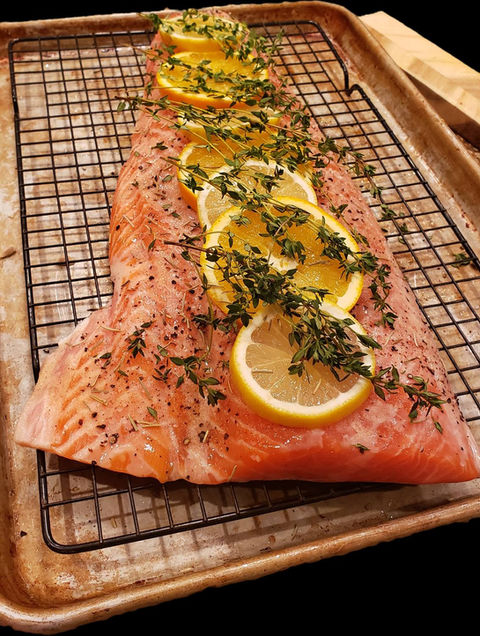 Smoked citrus glazed, wild-caught salmon going in to the smoker