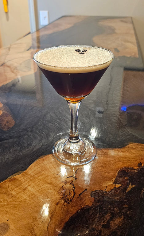 Espresso Martini: Vanilla vodka, Kahlua & espresso, garnished with three
coffee beans to wish you health, wealth, and happiness!