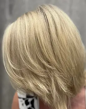 Decorative image showing an example of the New Guest: Bombshell Blonde service.