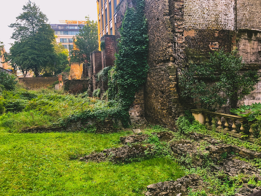 An overgrown piece of land amongst the ruins of the old London wall. A small area of ruggedness in central London.