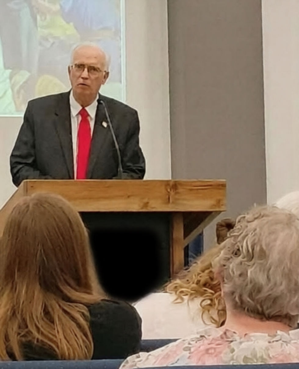 Ben behing Pulpit teaching_edited.jpg