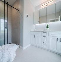 primary suite white bathroom