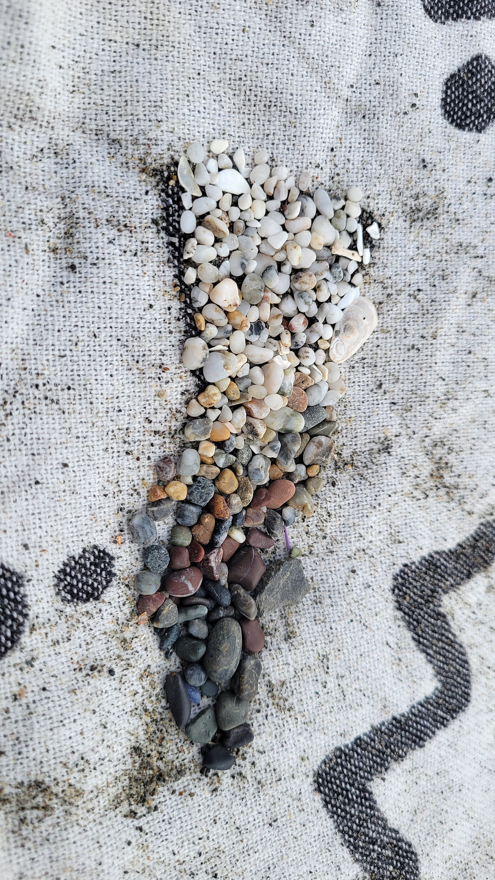 An arrangement of beach pebbles.