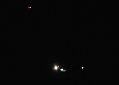 Two crafts pass closely by one another