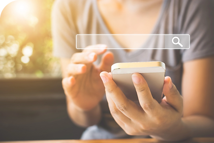 woman on phone with a search bar