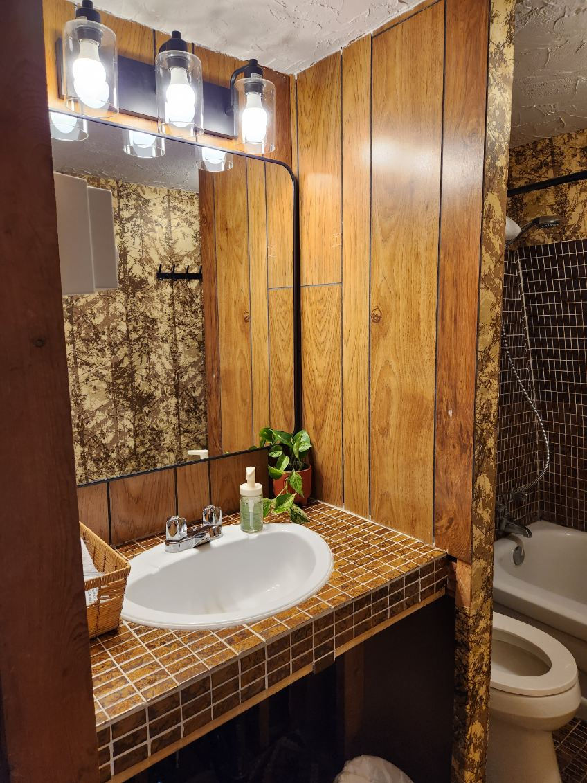 Bathroom with tub and shower