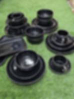 Black dinnerware set: plates, bowls, cups