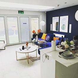 Interior photo taken from the completed kitchen looking out to the living room area in the extension