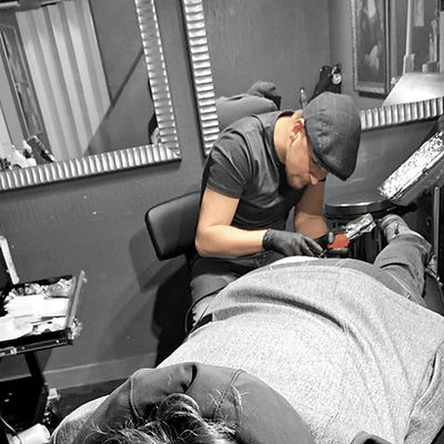 Conor-Tattoo-Action-3_edited.jpg