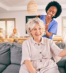 nurse-brush-hair-of-happy-mature-woman