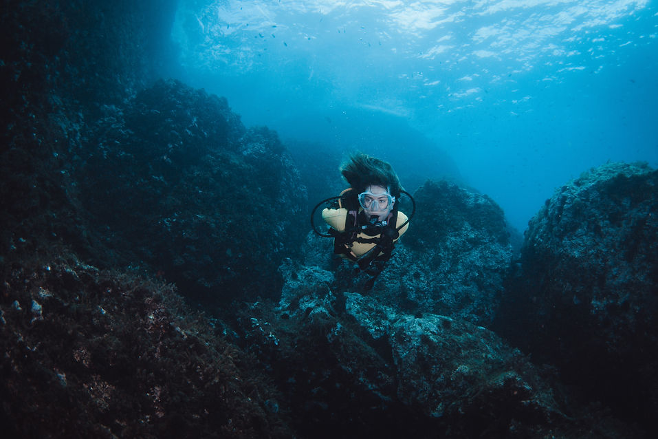 young-woman-doing-scubadiving-in-the-crystal-water-of-the-mediterranean-sea.jpg