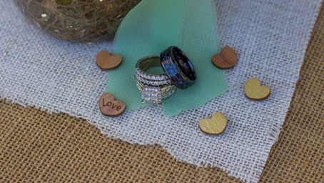 Bride and Groom rings, close up detail photo