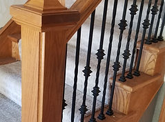 subtle stair pattern with iron spindles