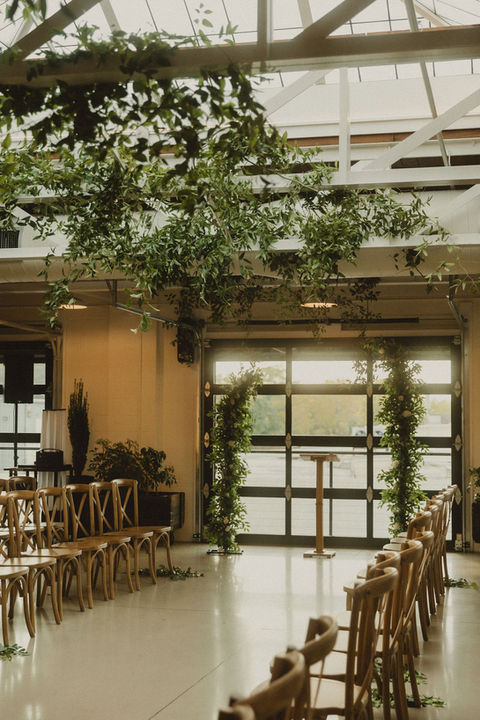 Elegant greenery decorates wedding ceremony space
