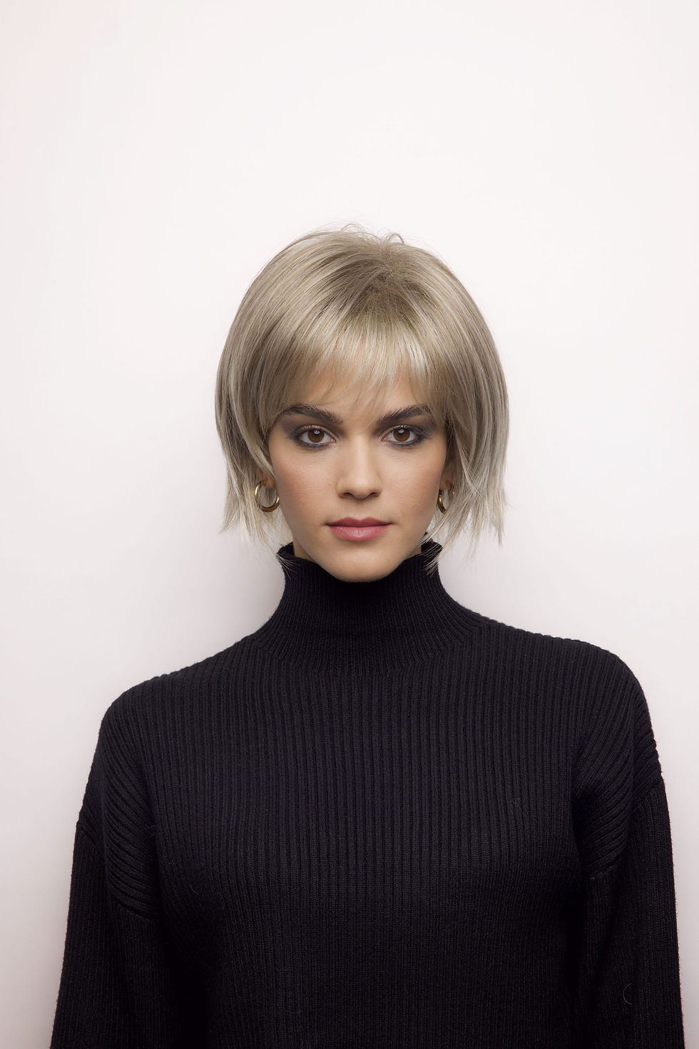 Thumbnail: Front view of Pax, short, choppy Bob with fringe.