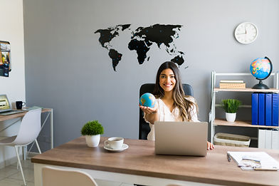 holding-world-my-hands-attractive-female-travel-agent-showing-globe-smiling-while-working-