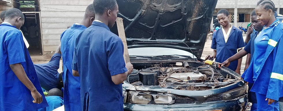 Form 5 students fault-tracing during their practicals