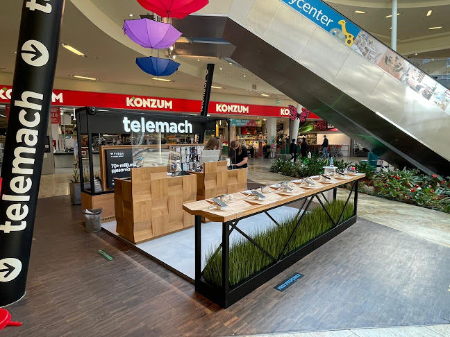 Discover Ollo Studio's sales booth design for Telemach, featuring an open retail concept, multiple design studies, customer-focused layouts and production-ready solutions for shopping centre environments.