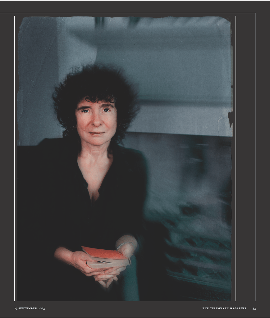 Telegraph Magazine article p2 - Jeanette Winterson in all black standing in her home, 
