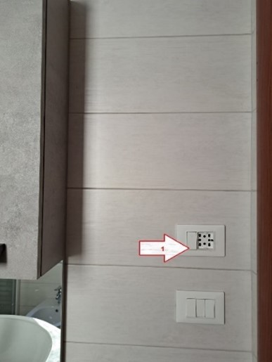 Reference photo of the bathroom water-heater switch