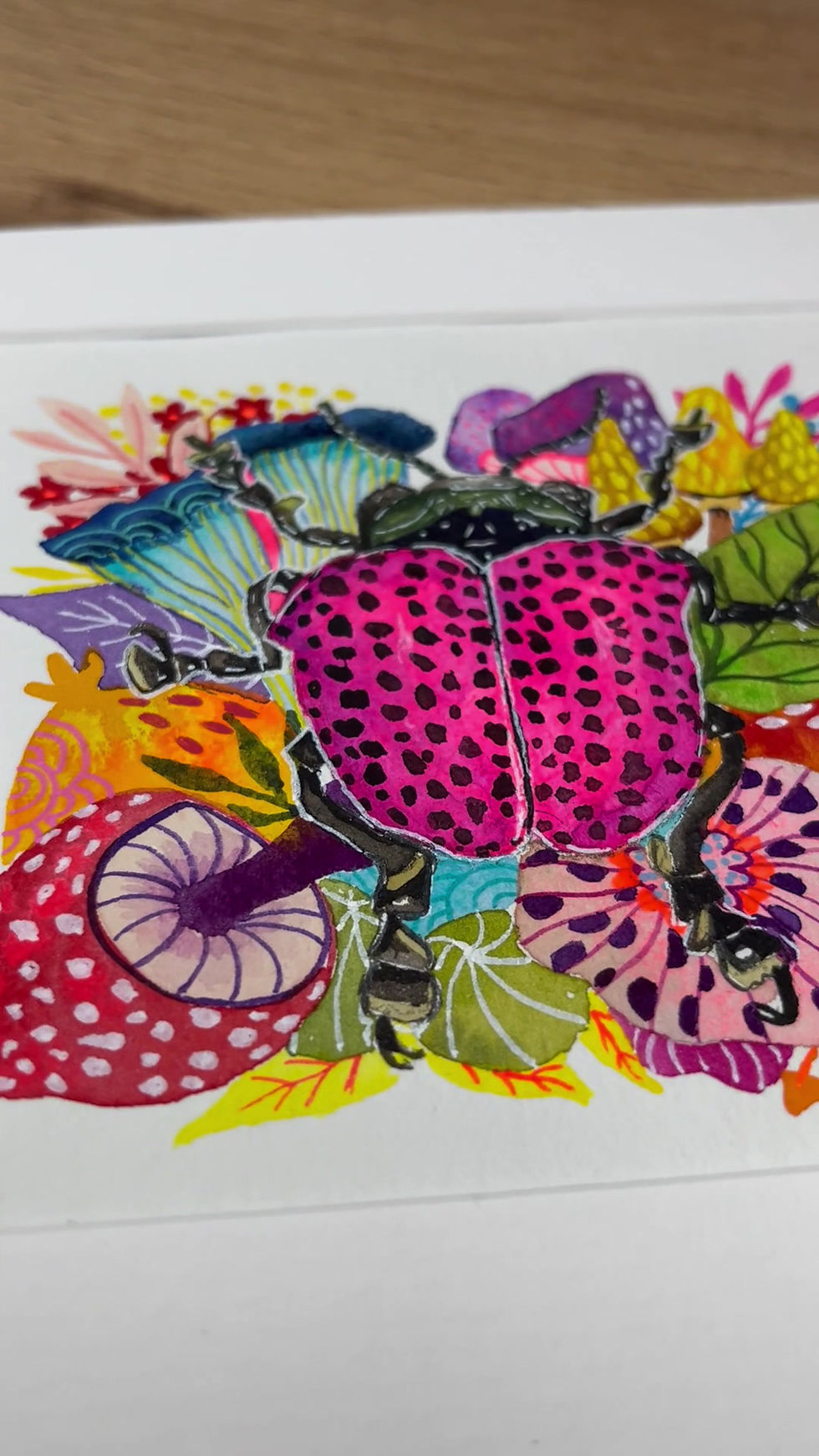 Thumbnail: Cadre aquarelle d’un doryphore rose avec fleurs et champignons exotiques, pièce décorative unique.