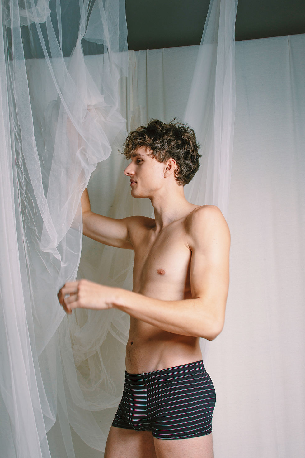 Thumbnail: Black Sheer Striped Trunk Boxer Brief Side View on Model