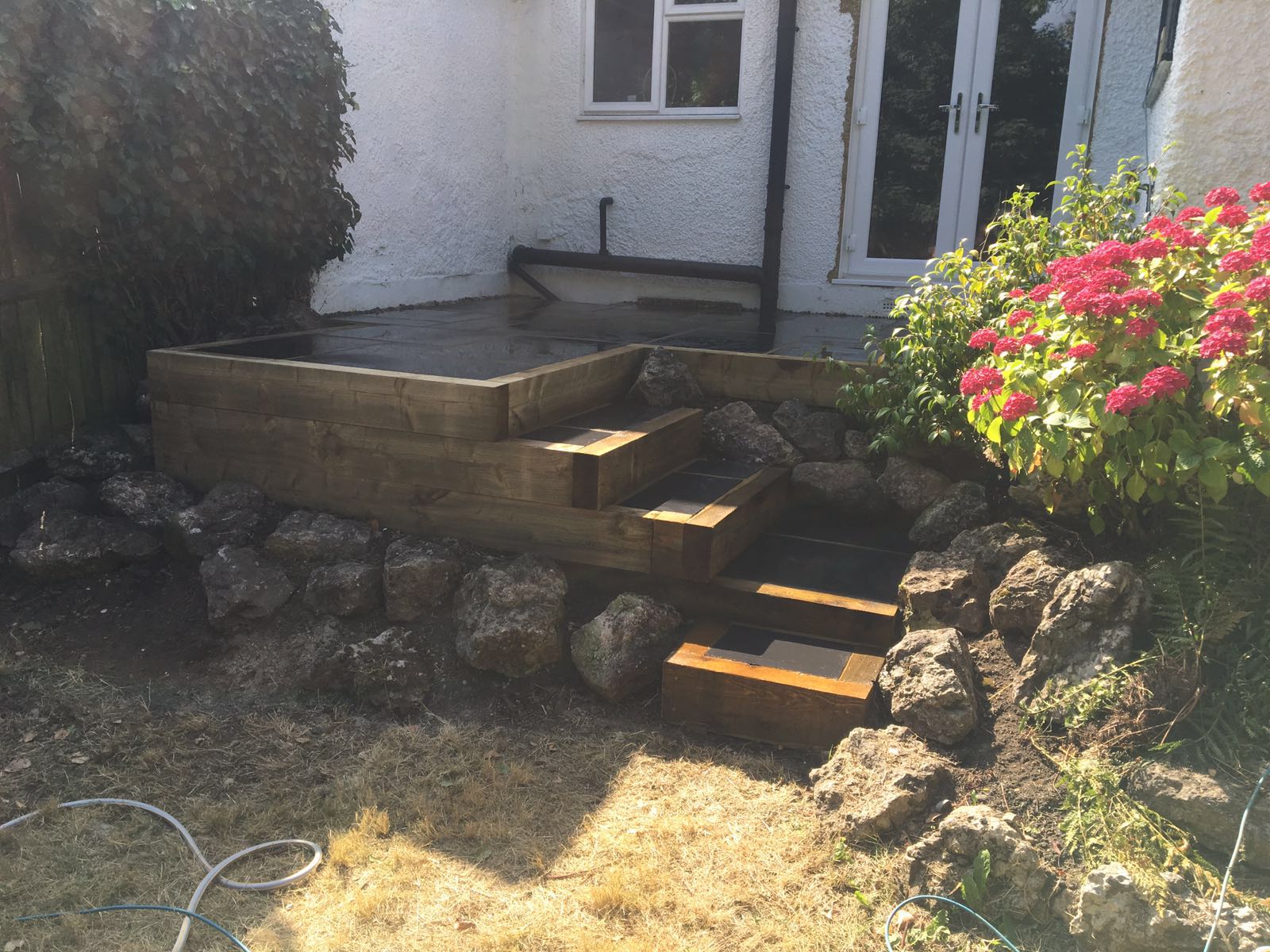 Limestone patio and steps in Bushey