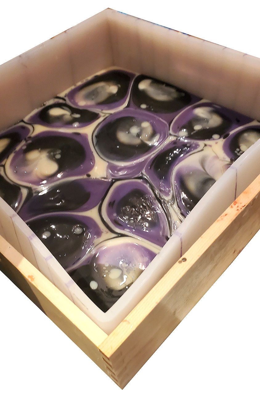 Thumbnail: Slab of Soap in whie purple and black coloring