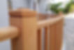 Image of wooden railing showcasing Strike forces's work.