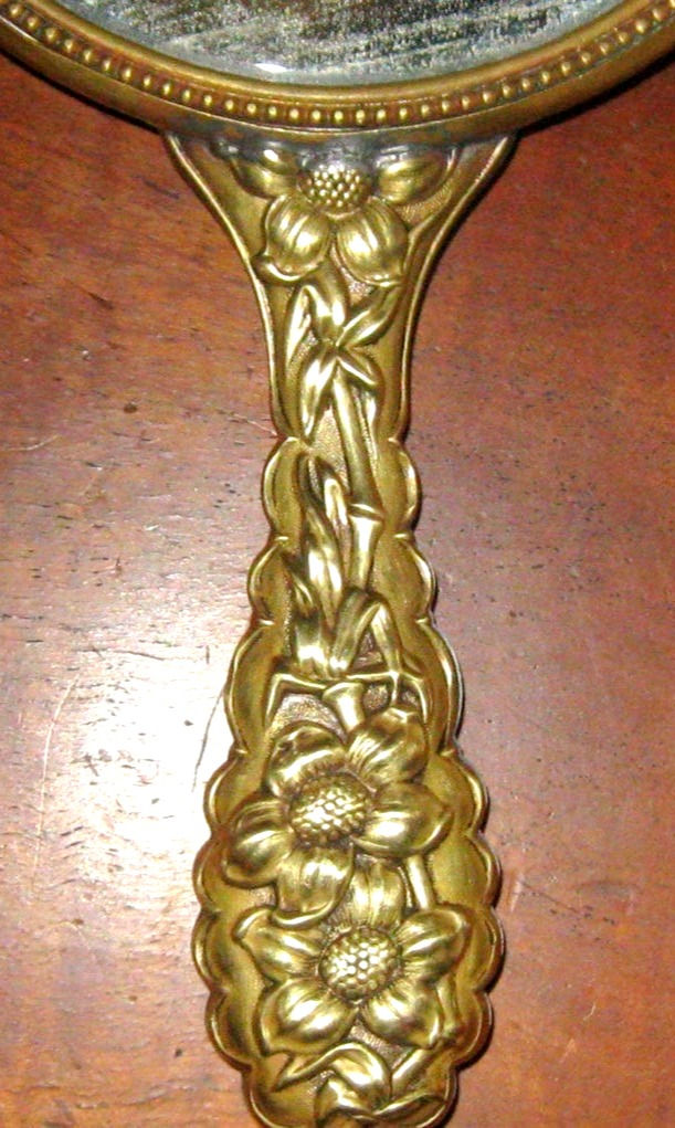 Thumbnail: nouveau brass hand mirror