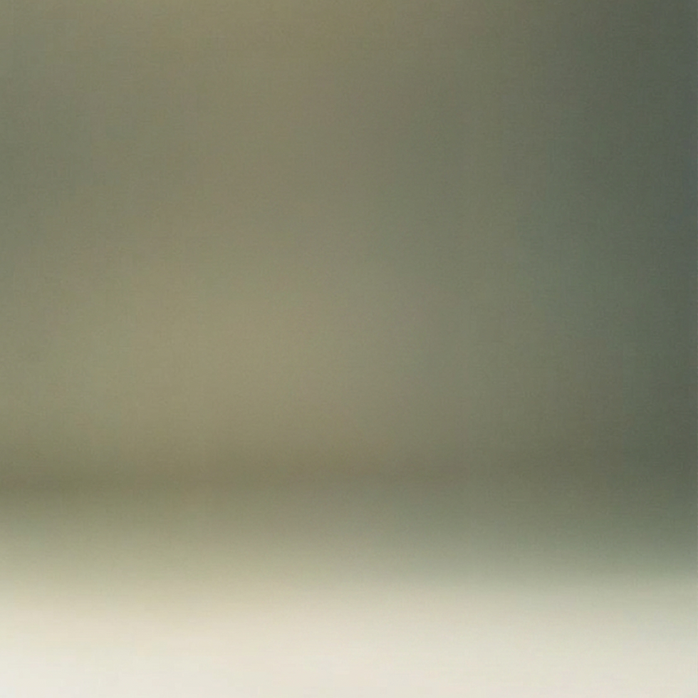 muted_olive_gradient_studio_backdrop.png