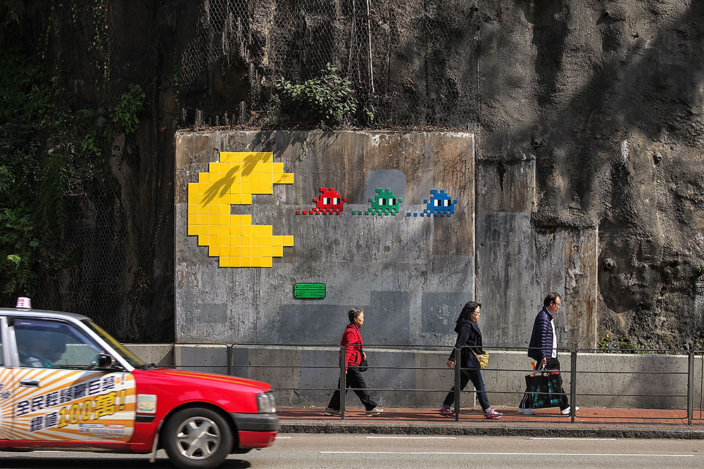 SaaS Is Eating The Security World. Photo: Invader art in Hong Kong https://www.space-invaders.com/world/hong-kong/