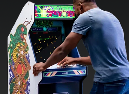 MOCKEDUP 3 man playing arcade game no bg copy.png