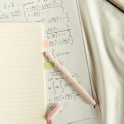 Maths homework with a pen