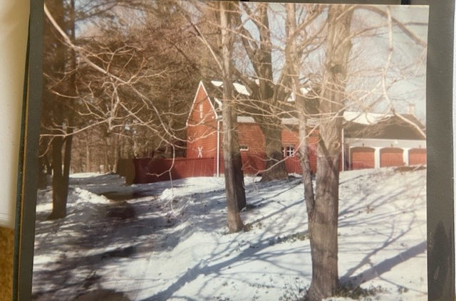 Mather Homestead in 1982 showing the barn in snow