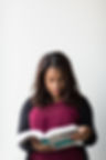 Woman reading a tech book