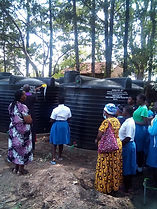 Priest blessing St Mary_s water tanks.jpg